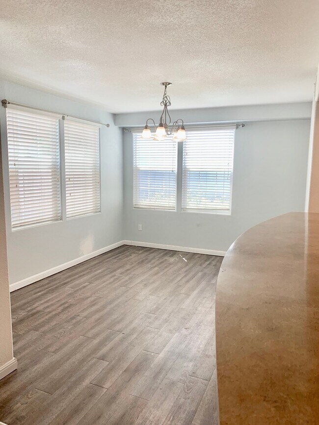 Building Photo - Superb Suburban Home with multiple outdoor...