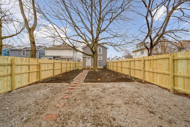 Backyard facing home - 1408 S Ohio Ave