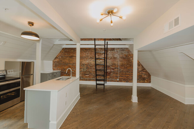 Open Floor Plan + Exposed Brick - 939 Piedmont Avenue