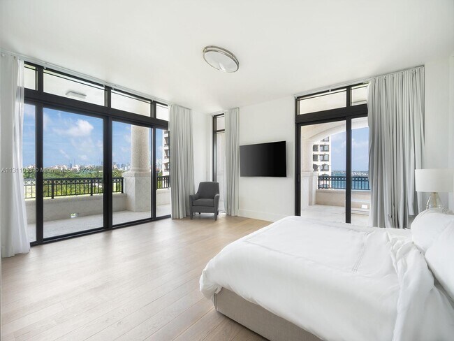 Building Photo - 7051 Fisher Island Dr