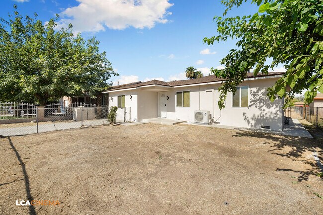 Building Photo - 10800 Santa Barbara St