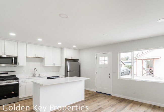 Building Photo - Welcome to your beautifully renovated sing...