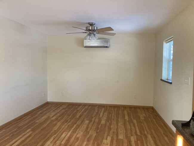 Living room (In floor heat with air conditioning unit) - 310 S 1st St