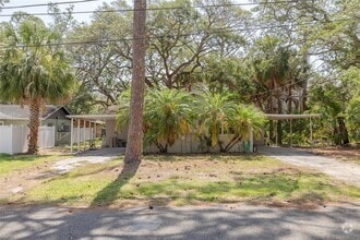Building Photo - 7116-7120 Oakwood Dr