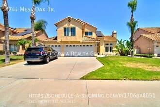 Building Photo - 8744 Mesa Oak Dr