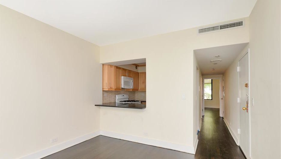 Living Area/Kitchen - 167 E 61st St