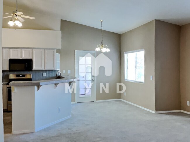 Building Photo - 5225 W Reno Ave Unit 204