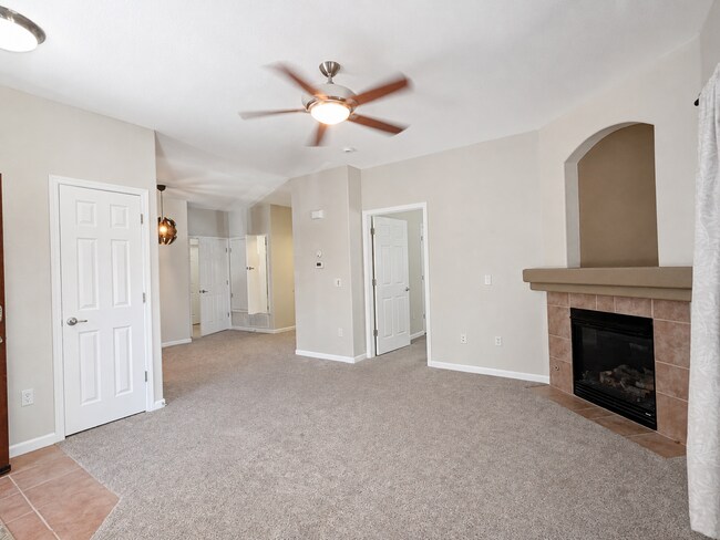 Building Photo - Spacious 2-Bedroom Condo with Garage, Fireplace, Pool & Most Included Utilities