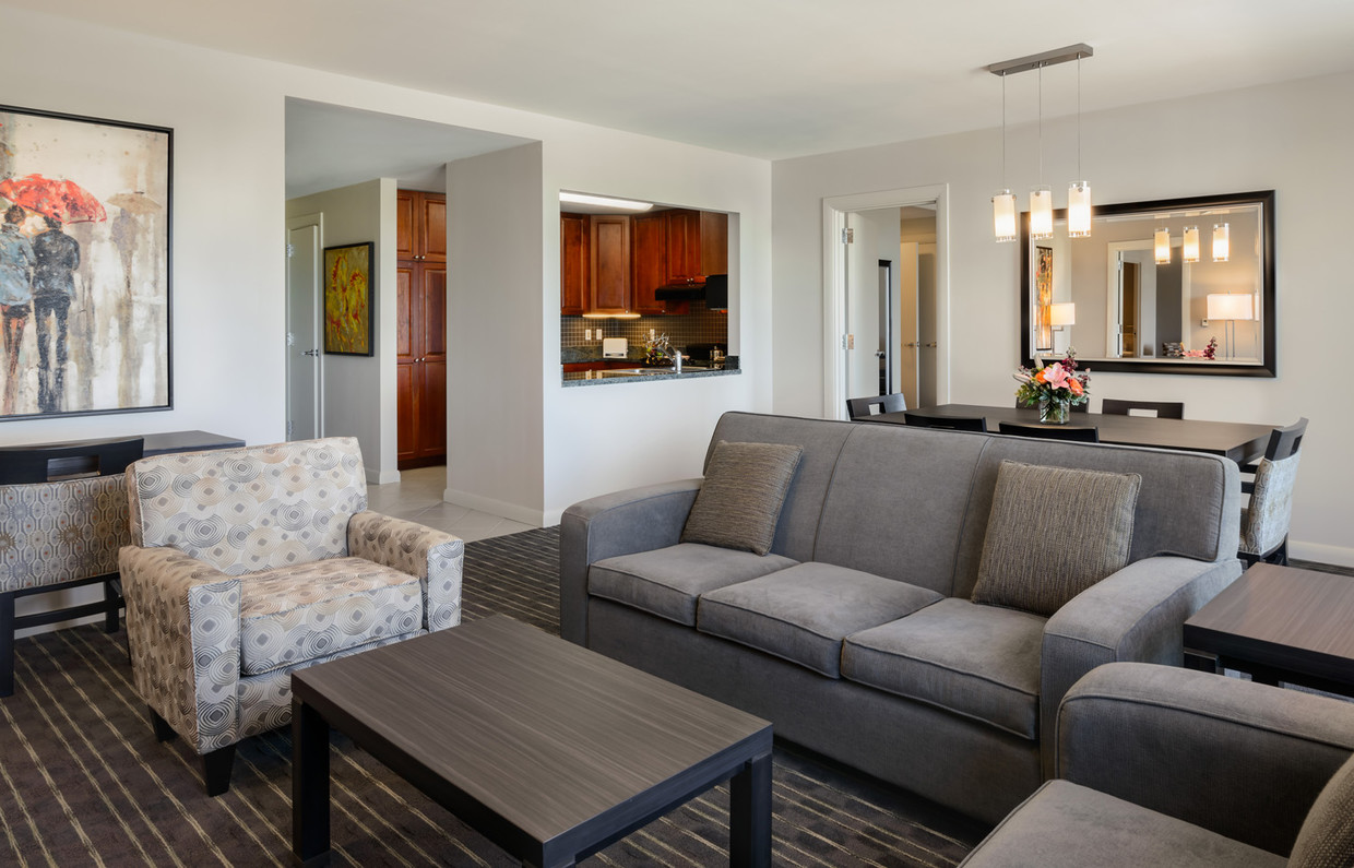 Enjoy our spacious living room. - Broadway Plaza - Mayo Clinic