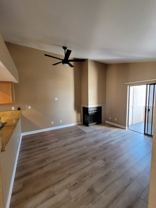 Fireplace and Slioding door to patio - 1065 W 1st St