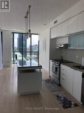 Building Photo - 110 Charles St E