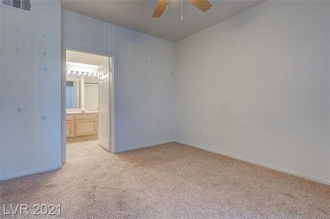 Building Photo - DOWNSTAIRS 2 BEDROOM CONDO IN GUARD GATED ...