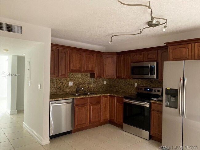 Building Photo - 12235 SW 17th Ln  106-Q Miami Fl 33175