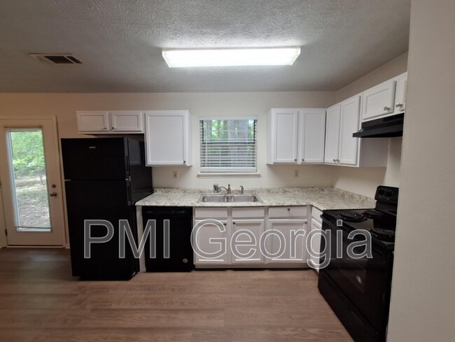 Building Photo - 6562 Carriage Ln