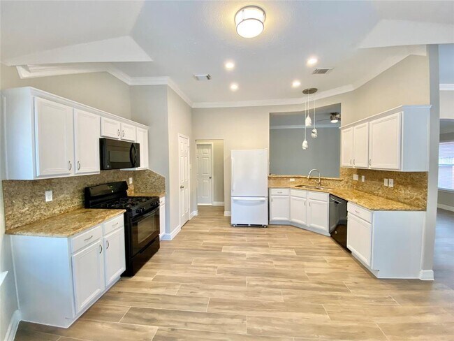 Foto del edificio - 46 Windswept Oaks Pl