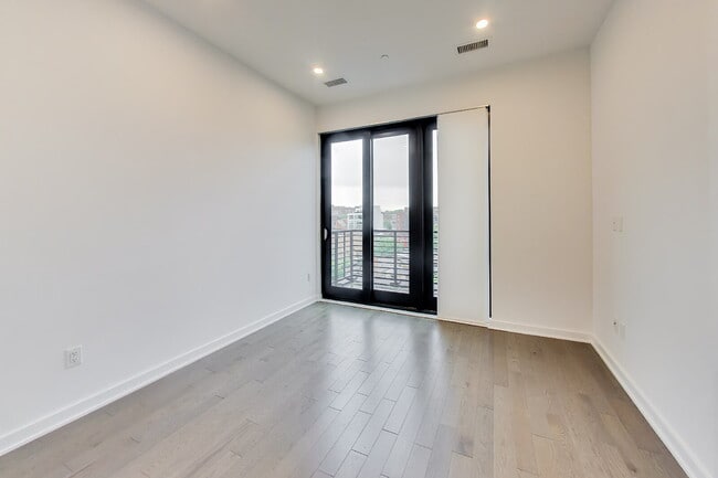 Building Photo - Top floor residence in elevator building with sweeping views.