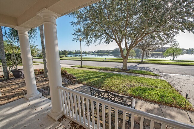 Building Photo - Spacious 4/3.5 with Stunning Lake Views in...