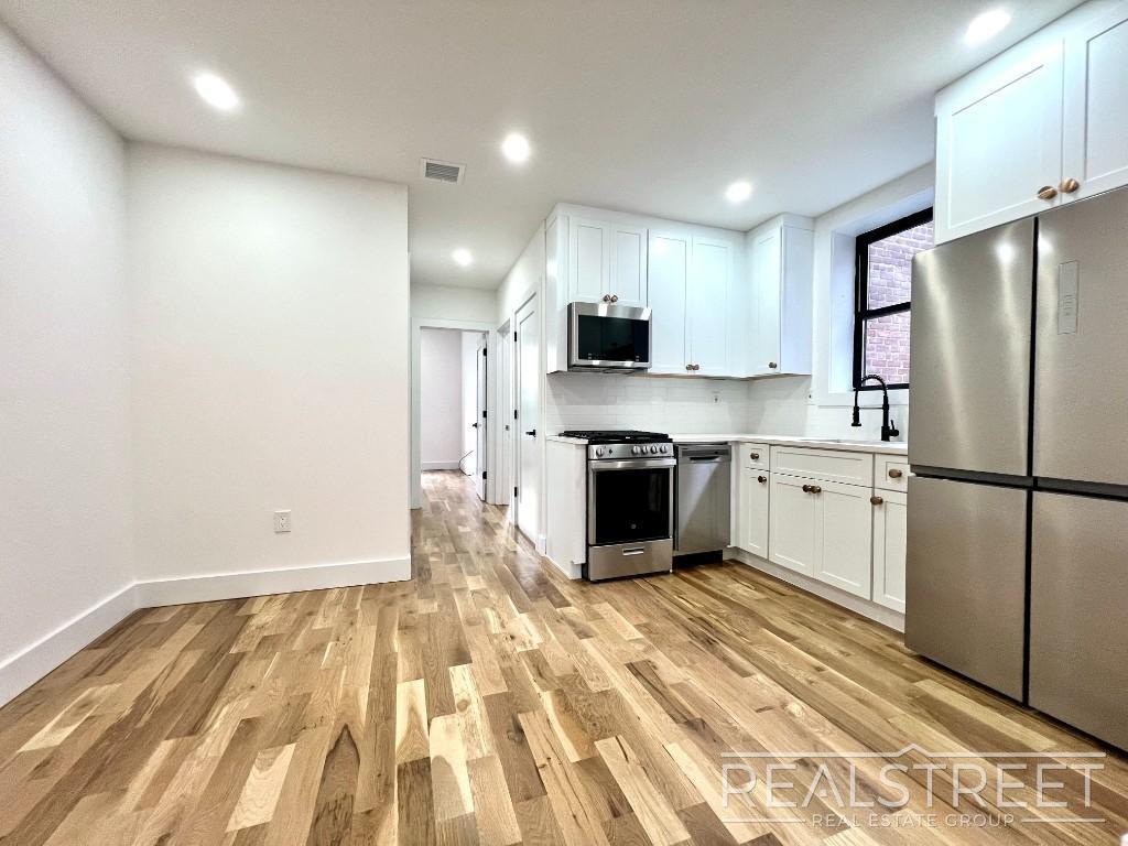 Foto principal - BRAND NEW 4 Bed 3 Bath + W/D & DW in unit