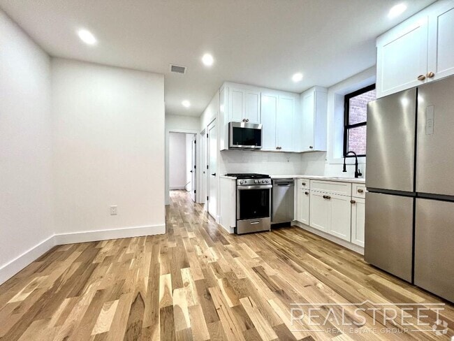 Building Photo - BRAND NEW 4 Bed 3 Bath + W/D & DW in unit