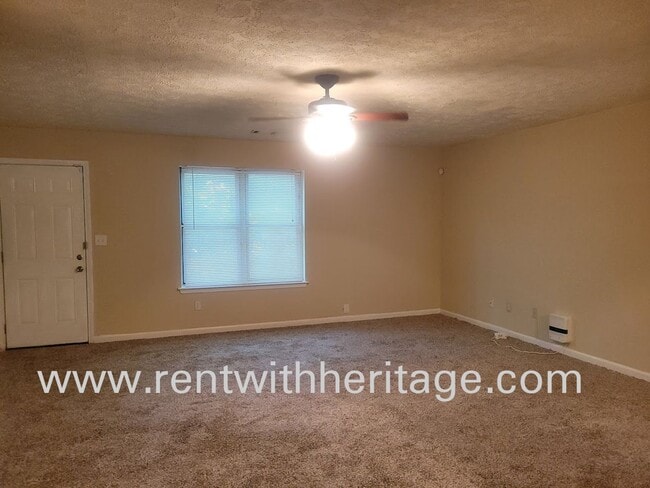 Building Photo - WOW!!!.....AWESOME BRICK TOWNHOME ( CORNER...