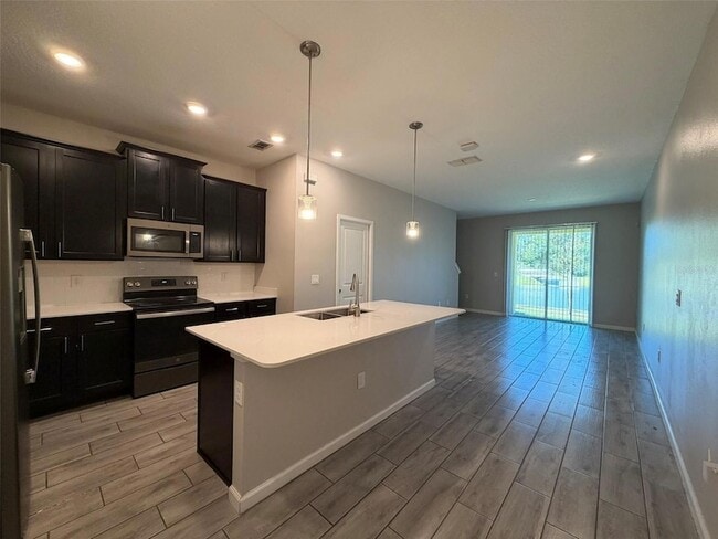 Photo - 9360 Tecumseh Dr Townhome