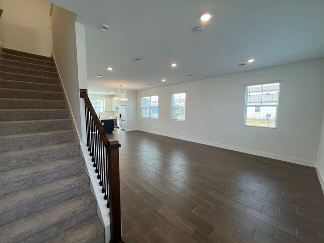 Building Photo - Just Built in Winter Garden! Stunning 3BR Townhome with Designer Layout