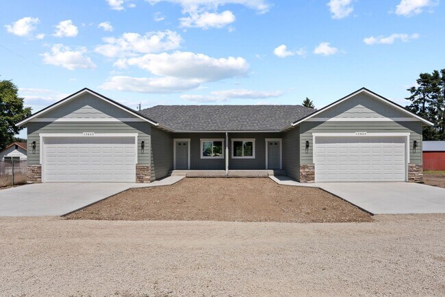 Building Photo - Newly built 4 Bedroom Duplex With Garage