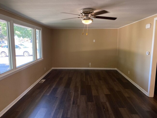 Building Photo - Cozy Silvis Home With Huge Fenced Yard and Attached Garage!