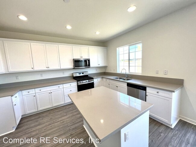 Building Photo - 4 br, 3 bath House - 9630 Honeyberry Ln.