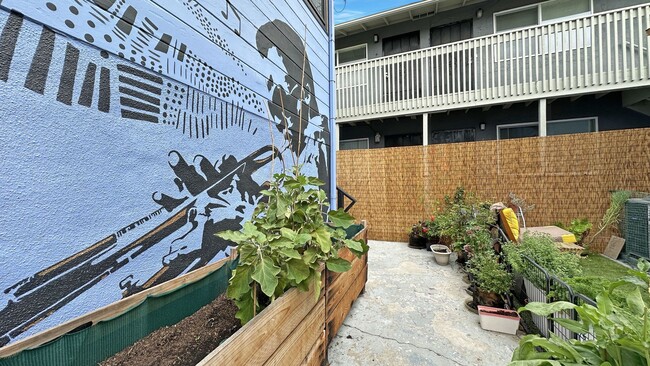 Building Photo - Cozy Studio with Fantastic Landscaping in ...