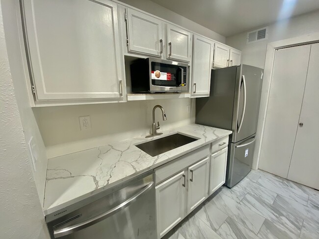 All brand New Stainless Appliances with Farm Style Rectangular Sink - 18333 Roehampton Dr