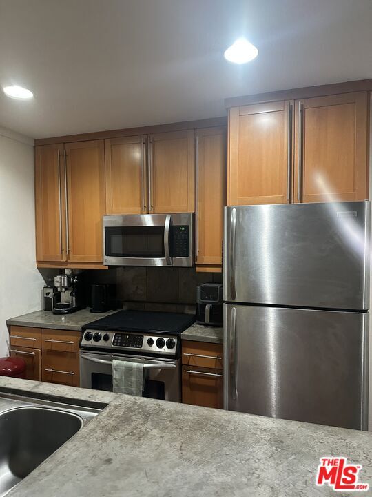 Building Photo - 1230 N Sweetzer Ave