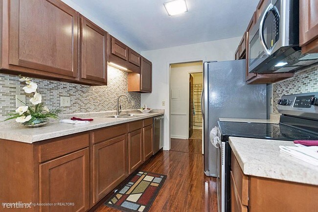 Building Photo - 1 br, 1 bath Condo - 6150 Cobblers Dr Apt 117