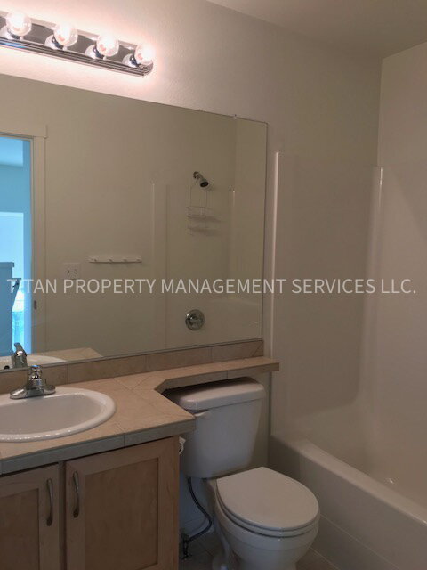 Building Photo - Beautiful Three Story Townhouse with Gas Fireplace, Balcony & 2-Car Garage