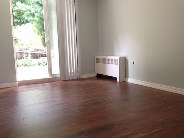 Living room with french doors to backyard - 5925 Post Rd