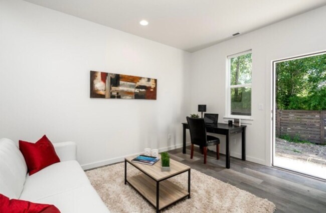 Building Photo - Spacious 3-Story Modern Community Featurin...