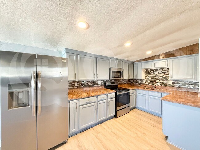 Foto del edificio - 6549 E Arbor Ave