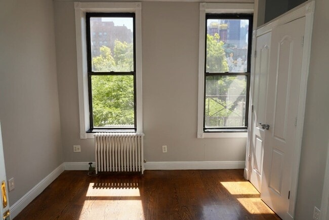 Building Photo - 697 Tenth Ave (47th & 48th Ave), #2FS