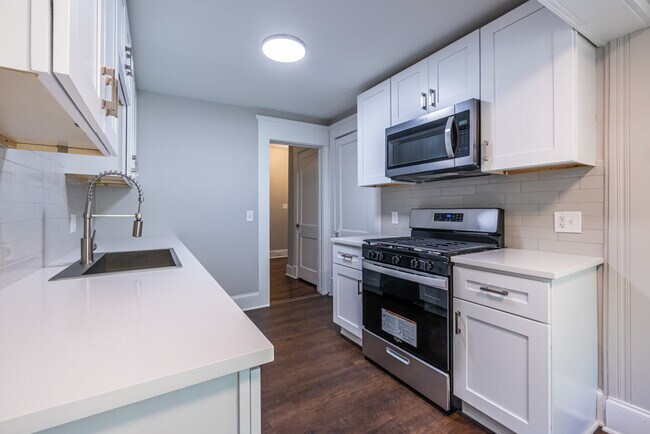 Renovated kitchen with stainless steel appliances - 1450 Piedmont Ave NE