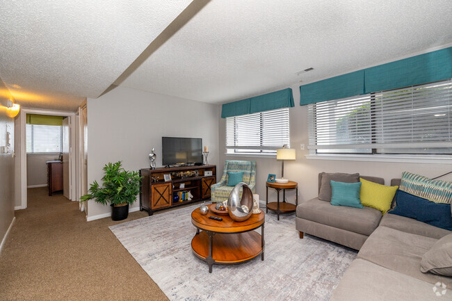 2BR, 1BA - 908SF - Living Room - The Club at Cherry Hills Apartments