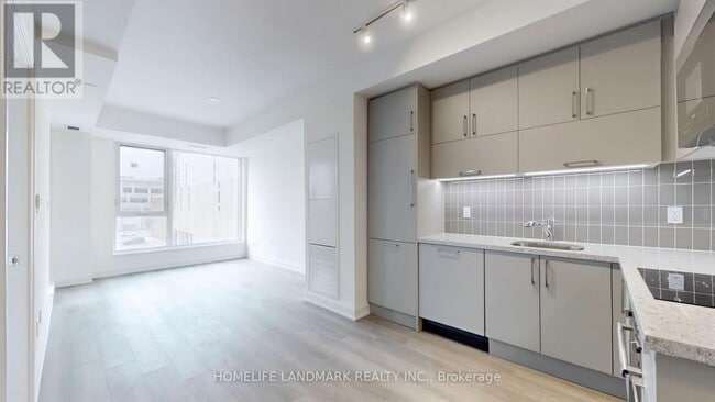 Building Photo - 38-438 Andre de Grasse St