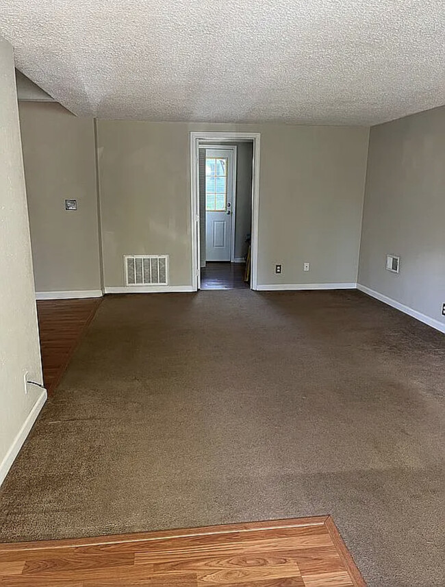 Mudroom with access to backyard - 207 Kibler Rd