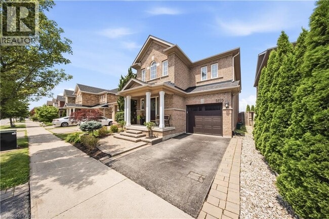 Building Photo - 5875 Blue Spruce Ave