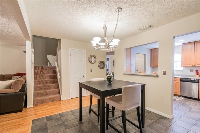 Building Photo - Spacious Hidden Haven Townhome