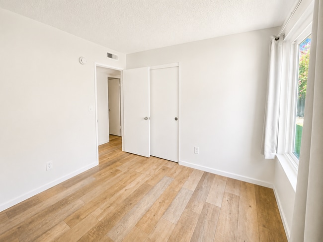 Building Photo - Welcome to this beautifully updated 4-bedroom, 2-bathroom home nestled on a private flag lot in t...
