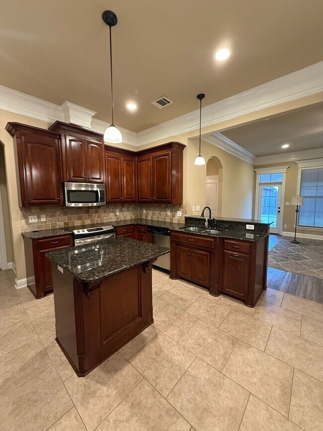 Building Photo - Haughton! Charming 3-Bedroom Brick Home with Spacious Yard