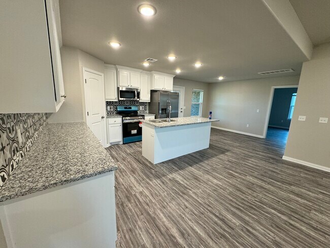 Cocina con electrodomésticos de acero inoxidable. - 3609 Gallant Fox Ave