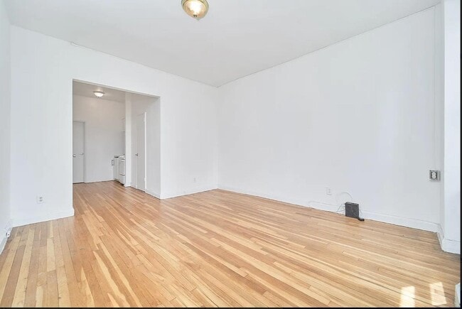 Building Photo - Large Sun Drenched One-Bedroom in the Heart of Hell's Kitchen