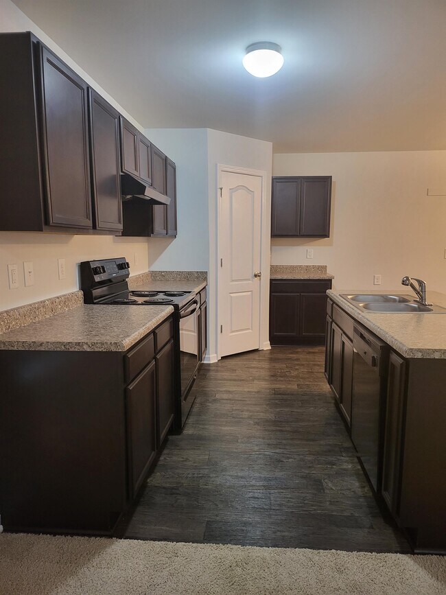 Building Photo - 7123 Woodmark Dr