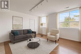 Building Photo - 3635 Dundas St W